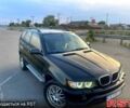 Черный БМВ Х5, объемом двигателя 3 л и пробегом 300 тыс. км за 8500 $, фото 1 на Automoto.ua