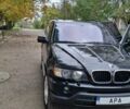 Черный БМВ Х5, объемом двигателя 3 л и пробегом 323 тыс. км за 9800 $, фото 1 на Automoto.ua