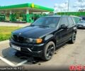 Черный БМВ Х5, объемом двигателя 4.4 л и пробегом 298 тыс. км за 8700 $, фото 1 на Automoto.ua