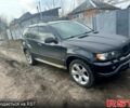 Черный БМВ Х5, объемом двигателя 4.4 л и пробегом 370 тыс. км за 8000 $, фото 1 на Automoto.ua