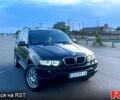 Черный БМВ Х5, объемом двигателя 3 л и пробегом 300 тыс. км за 8500 $, фото 1 на Automoto.ua