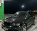 Черный БМВ Х5, объемом двигателя 4.4 л и пробегом 300 тыс. км за 6399 $, фото 1 на Automoto.ua