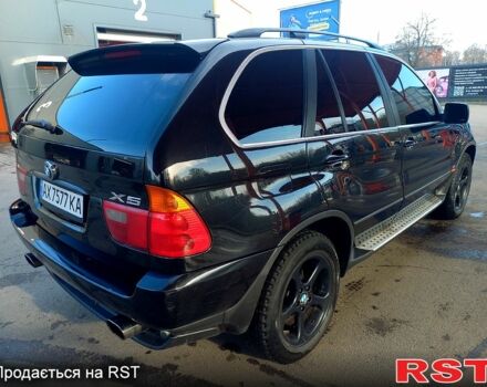 Черный БМВ Х5, объемом двигателя 4.4 л и пробегом 240 тыс. км за 6300 $, фото 4 на Automoto.ua