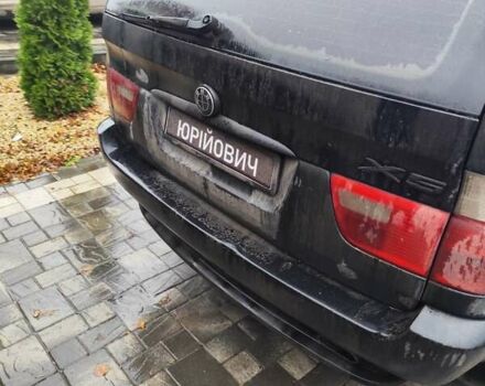 Чорний БМВ Х5, об'ємом двигуна 3 л та пробігом 400 тис. км за 7400 $, фото 4 на Automoto.ua