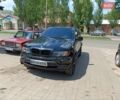 Черный БМВ Х5, объемом двигателя 4.4 л и пробегом 280 тыс. км за 14500 $, фото 1 на Automoto.ua