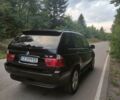 Черный БМВ Х5, объемом двигателя 3 л и пробегом 297 тыс. км за 8750 $, фото 1 на Automoto.ua