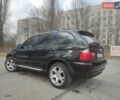 Черный БМВ Х5, объемом двигателя 4.4 л и пробегом 233 тыс. км за 9500 $, фото 1 на Automoto.ua