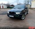 Черный БМВ Х5, объемом двигателя 2.9 л и пробегом 323 тыс. км за 12000 $, фото 1 на Automoto.ua