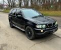 Черный БМВ Х5, объемом двигателя 3 л и пробегом 400 тыс. км за 5300 $, фото 2 на Automoto.ua