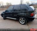 Черный БМВ Х5, объемом двигателя 2.9 л и пробегом 323 тыс. км за 12000 $, фото 4 на Automoto.ua