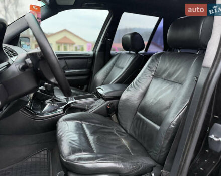Черный БМВ Х5, объемом двигателя 3 л и пробегом 400 тыс. км за 8700 $, фото 46 на Automoto.ua