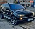 Чорний БМВ Х5, об'ємом двигуна 4.4 л та пробігом 320 тис. км за 9999 $, фото 1 на Automoto.ua