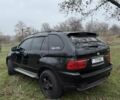 Черный БМВ Х5, объемом двигателя 3 л и пробегом 404 тыс. км за 9500 $, фото 1 на Automoto.ua