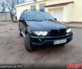 Черный БМВ Х5, объемом двигателя 2.9 л и пробегом 323 тыс. км за 12000 $, фото 1 на Automoto.ua