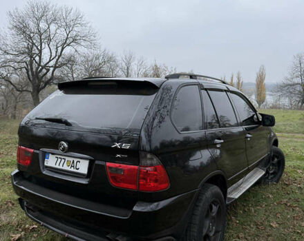 Черный БМВ Х5, объемом двигателя 2.98 л и пробегом 404 тыс. км за 9500 $, фото 2 на Automoto.ua