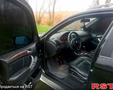 Черный БМВ Х5, объемом двигателя 4.4 л и пробегом 276 тыс. км за 9200 $, фото 3 на Automoto.ua