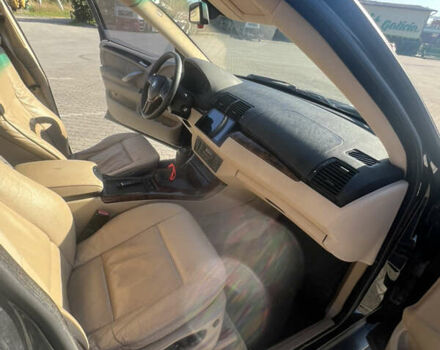 Черный БМВ Х5, объемом двигателя 3 л и пробегом 353 тыс. км за 10500 $, фото 4 на Automoto.ua