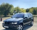 Черный БМВ Х5, объемом двигателя 3 л и пробегом 330 тыс. км за 6000 $, фото 1 на Automoto.ua