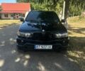 Чорний БМВ Х5, об'ємом двигуна 2.93 л та пробігом 282 тис. км за 8799 $, фото 1 на Automoto.ua