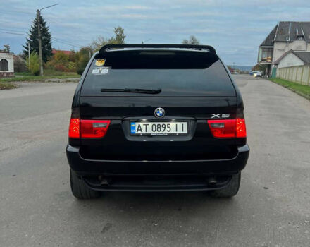 Чорний БМВ Х5, об'ємом двигуна 3 л та пробігом 384 тис. км за 9300 $, фото 6 на Automoto.ua