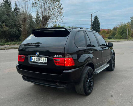 Чорний БМВ Х5, об'ємом двигуна 3 л та пробігом 384 тис. км за 9300 $, фото 4 на Automoto.ua