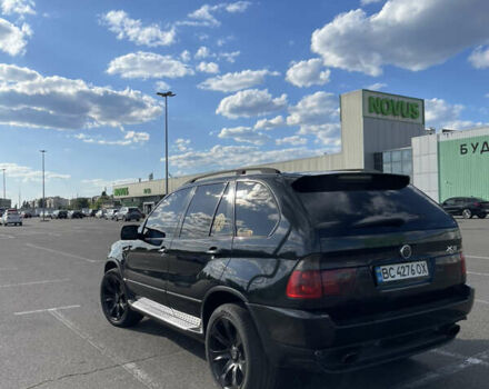 Чорний БМВ Х5, об'ємом двигуна 3 л та пробігом 430 тис. км за 11000 $, фото 4 на Automoto.ua