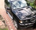 Чорний БМВ Х5, об'ємом двигуна 3 л та пробігом 300 тис. км за 12700 $, фото 1 на Automoto.ua