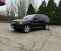 Черный БМВ Х5, объемом двигателя 3 л и пробегом 400 тыс. км за 4999 $, фото 1 на Automoto.ua