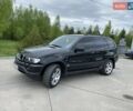 Черный БМВ Х5, объемом двигателя 2.93 л и пробегом 360 тыс. км за 12000 $, фото 1 на Automoto.ua