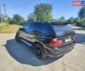 Черный БМВ Х5, объемом двигателя 3 л и пробегом 400 тыс. км за 9500 $, фото 2 на Automoto.ua