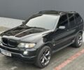 Черный БМВ Х5, объемом двигателя 4.4 л и пробегом 265 тыс. км за 11500 $, фото 1 на Automoto.ua
