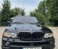 Черный БМВ Х5, объемом двигателя 2.98 л и пробегом 400 тыс. км за 9000 $, фото 1 на Automoto.ua