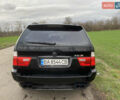 Черный БМВ Х5, объемом двигателя 2.99 л и пробегом 244 тыс. км за 12000 $, фото 5 на Automoto.ua
