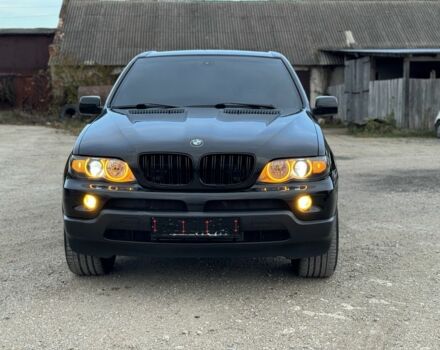 Черный БМВ Х5, объемом двигателя 3 л и пробегом 390 тыс. км за 11950 $, фото 1 на Automoto.ua