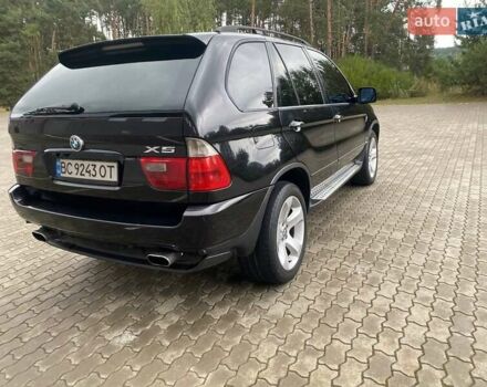 Черный БМВ Х5, объемом двигателя 3 л и пробегом 380 тыс. км за 11200 $, фото 1 на Automoto.ua