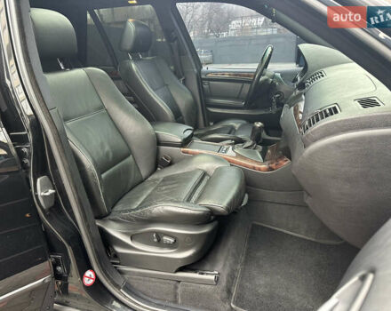 Черный БМВ Х5, объемом двигателя 4.4 л и пробегом 265 тыс. км за 10000 $, фото 42 на Automoto.ua