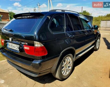 Чорний БМВ Х5, об'ємом двигуна 3 л та пробігом 241 тис. км за 11000 $, фото 26 на Automoto.ua
