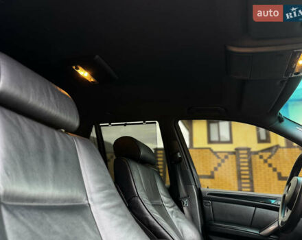 Чорний БМВ Х5, об'ємом двигуна 3 л та пробігом 375 тис. км за 13500 $, фото 110 на Automoto.ua