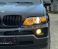 Черный БМВ Х5, объемом двигателя 3 л и пробегом 390 тыс. км за 11950 $, фото 2 на Automoto.ua