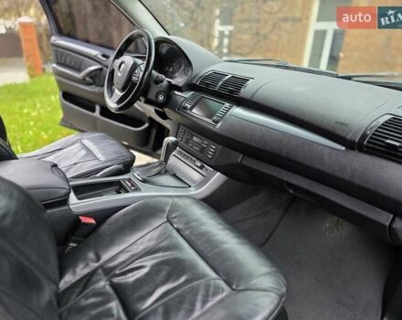 Черный БМВ Х5, объемом двигателя 4.4 л и пробегом 430 тыс. км за 6900 $, фото 12 на Automoto.ua