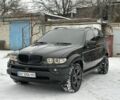 Черный БМВ Х5, объемом двигателя 3 л и пробегом 330 тыс. км за 12100 $, фото 1 на Automoto.ua