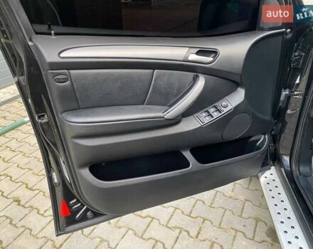 Черный БМВ Х5, объемом двигателя 3 л и пробегом 394 тыс. км за 11650 $, фото 26 на Automoto.ua