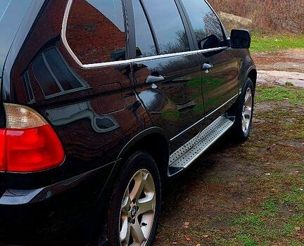 Черный БМВ Х5, объемом двигателя 3 л и пробегом 260 тыс. км за 9600 $, фото 1 на Automoto.ua