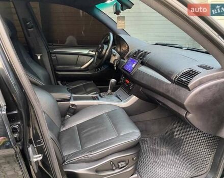 Черный БМВ Х5, объемом двигателя 3 л и пробегом 394 тыс. км за 11650 $, фото 28 на Automoto.ua