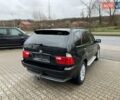 Черный БМВ Х5, объемом двигателя 3 л и пробегом 244 тыс. км за 5000 $, фото 1 на Automoto.ua