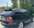 Чорний БМВ Х5, об'ємом двигуна 3 л та пробігом 330 тис. км за 10000 $, фото 4 на Automoto.ua