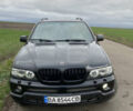 Черный БМВ Х5, объемом двигателя 2.99 л и пробегом 244 тыс. км за 12000 $, фото 1 на Automoto.ua