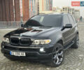 Черный БМВ Х5, объемом двигателя 4.4 л и пробегом 265 тыс. км за 10000 $, фото 1 на Automoto.ua