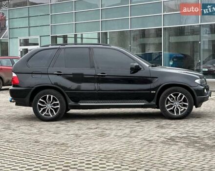 Черный БМВ Х5, объемом двигателя 3 л и пробегом 250 тыс. км за 12999 $, фото 1 на Automoto.ua