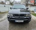Черный БМВ Х5, объемом двигателя 4.4 л и пробегом 430 тыс. км за 6900 $, фото 1 на Automoto.ua